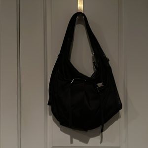 DKNY lightweight satiny nylon and leather trimmed shoulder bag.
